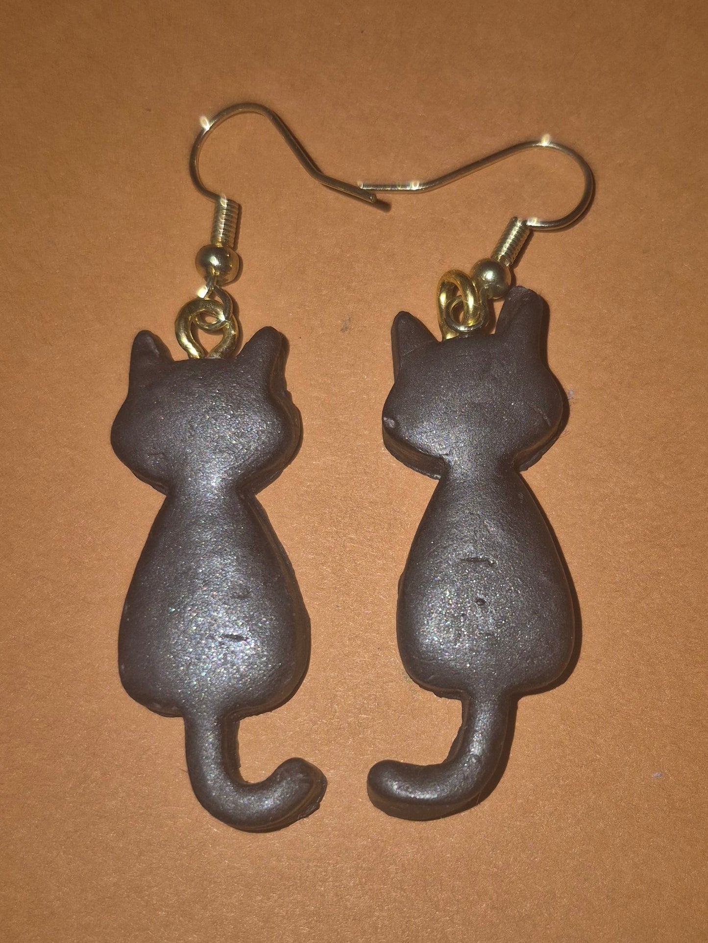 Black long tail cat earrings