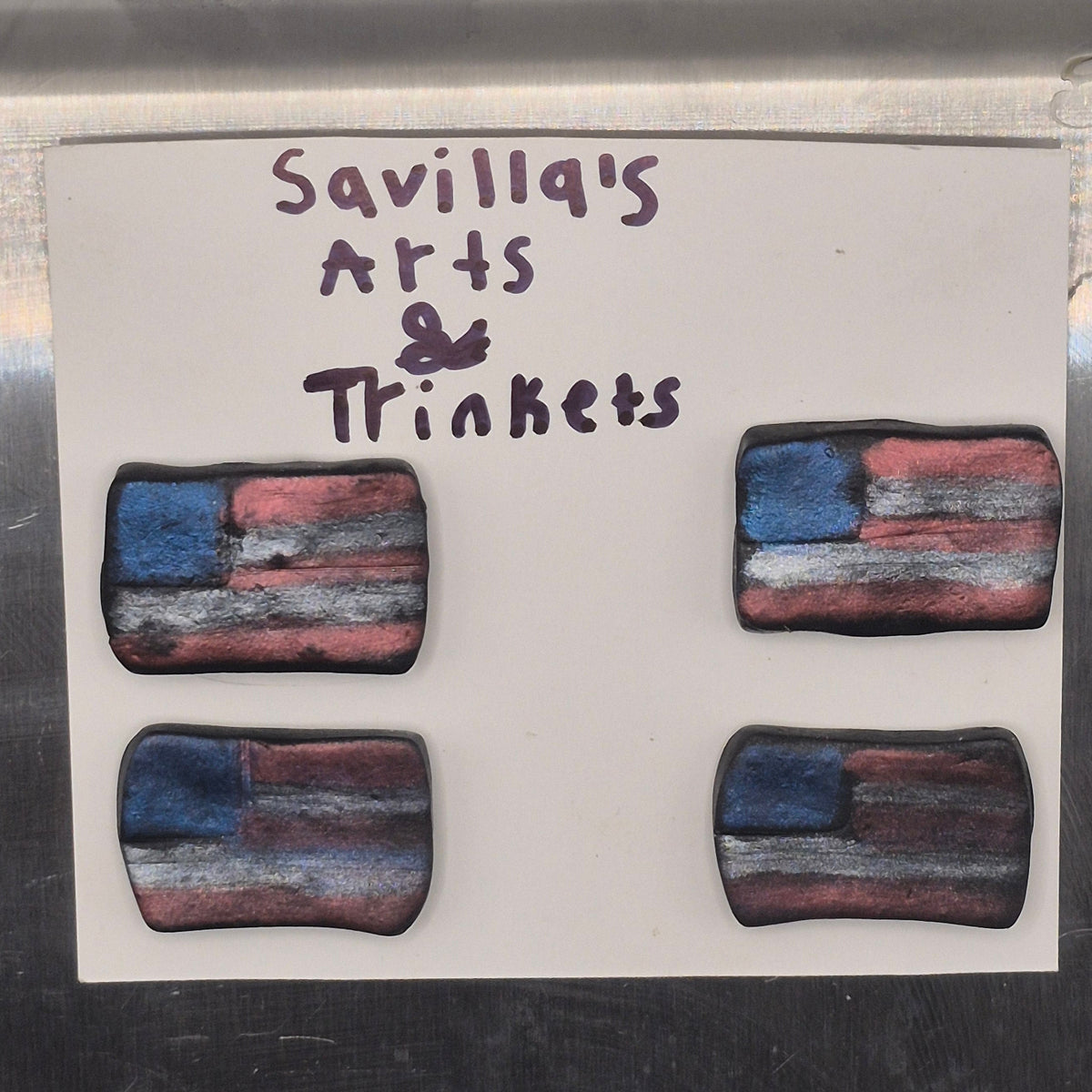 Four rectangular American flag-themed trinket boxes with a distressed red, white, and blue design, displayed on a white card labeled 'Savillq's Arts & Trinkets' against a metallic background.