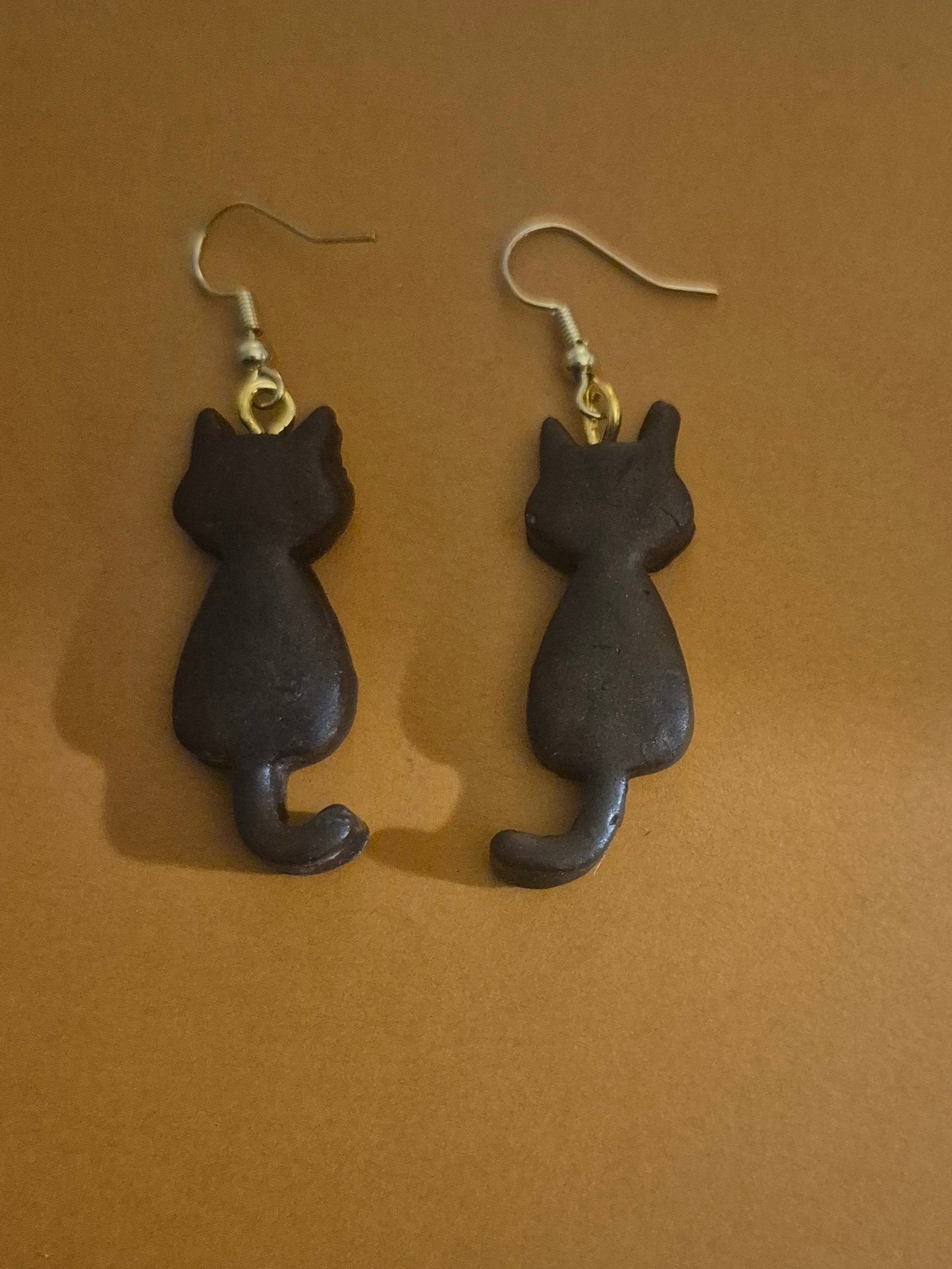 Black long tail cat earrings