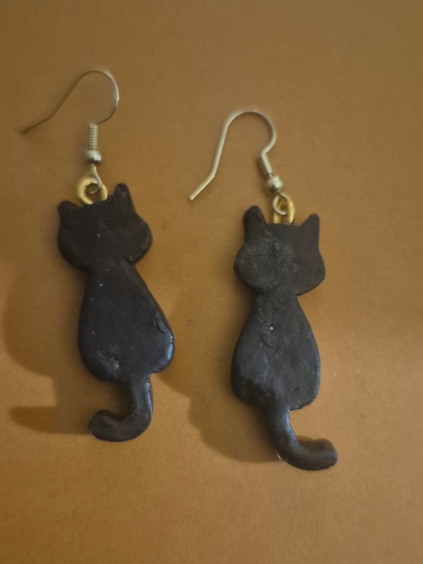 Black long tail cat earrings