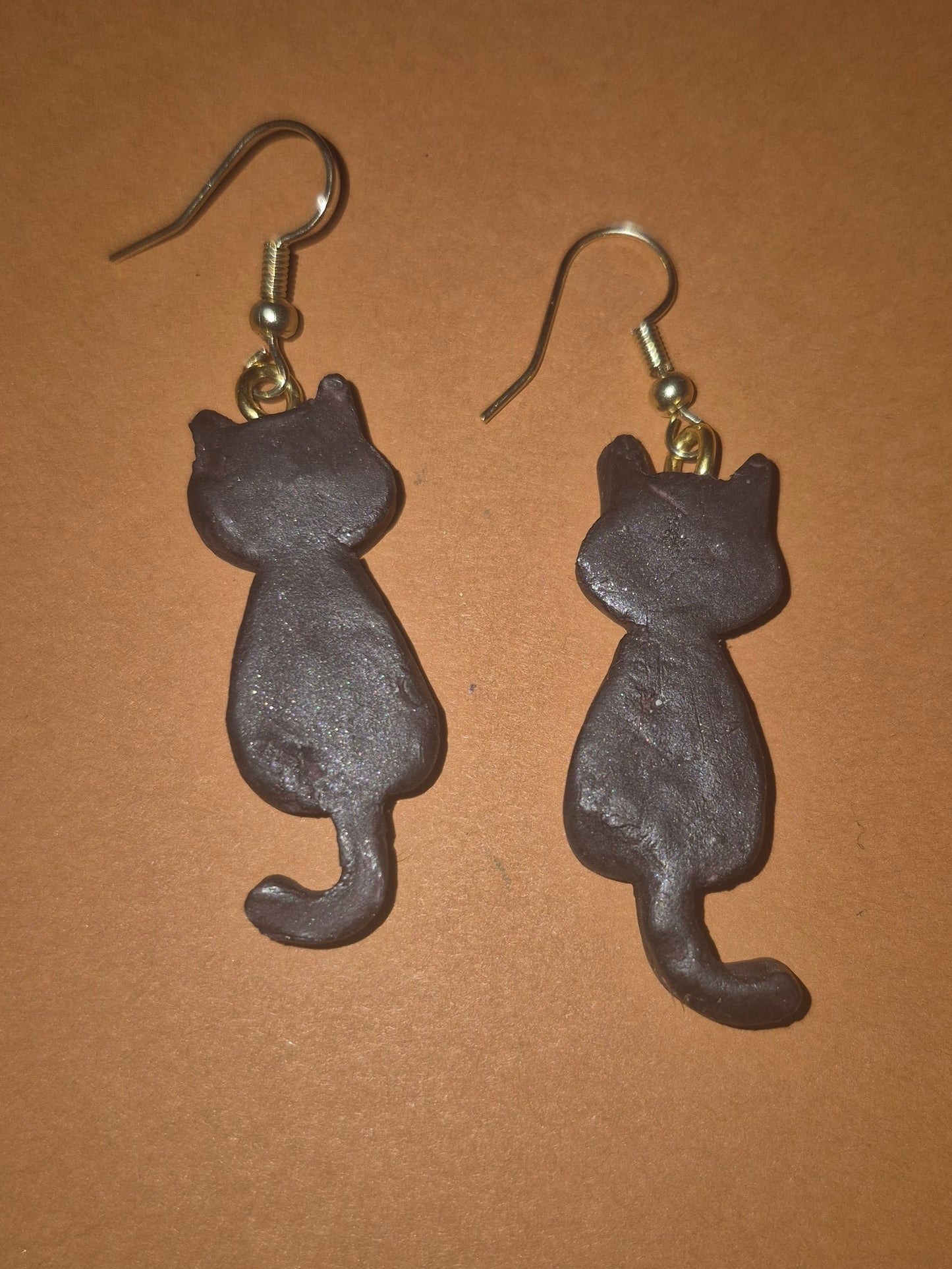 Black long tail cat earrings